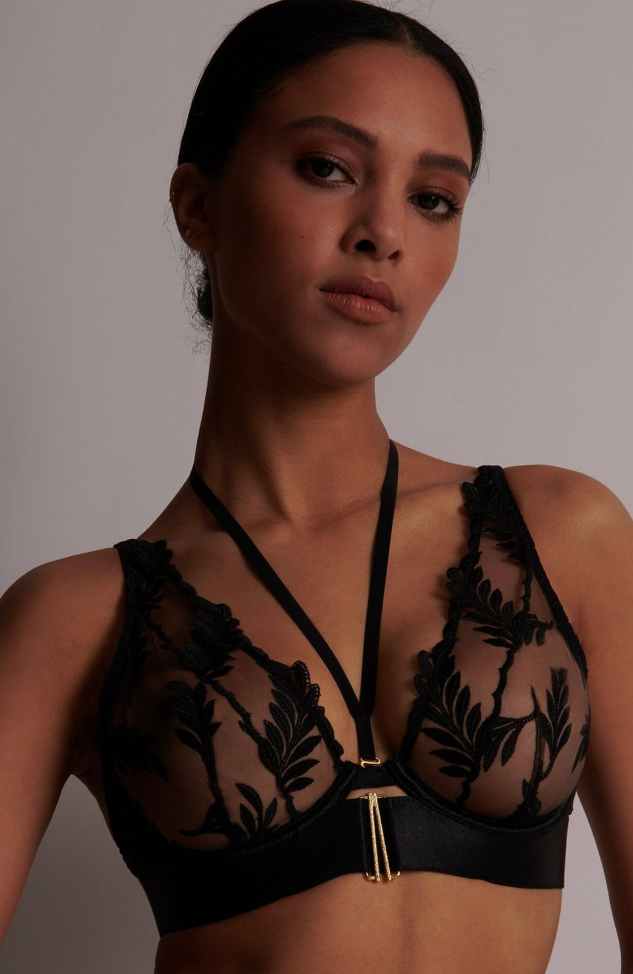 Бюстгальтер с треугольными чашками на косточках Бренд 